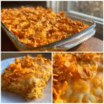 A close-up of a freshly baked Dorito Casserole in a glass baking dish, topped with melted cheese and crushed Doritos.